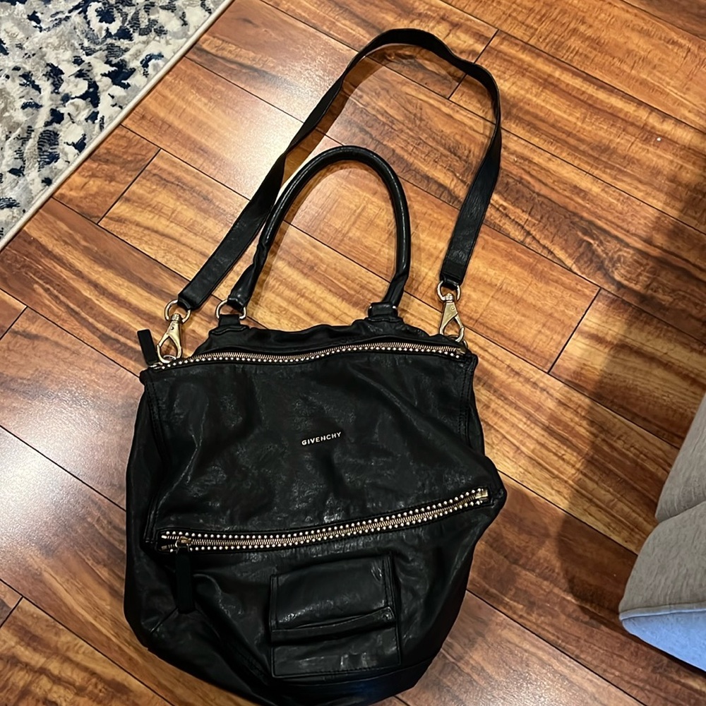 Givenchy handbag with gold ball embellishments.
